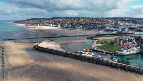 Fotografie Aerial drone view seaside of the neighboring towns of Trouville-sur-Mer and Deauville, Normandy, France, October 20, 2025