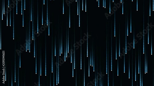Abstract blue light trails falling vertically on dark background