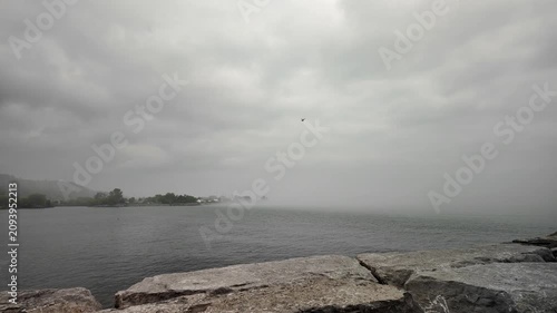  misty fog rising from Lake Ontario's cold depths  at Scarborough Bluffs in Toronto