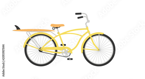 Foto Yellow beach cruiser bicycle with surfboard rack