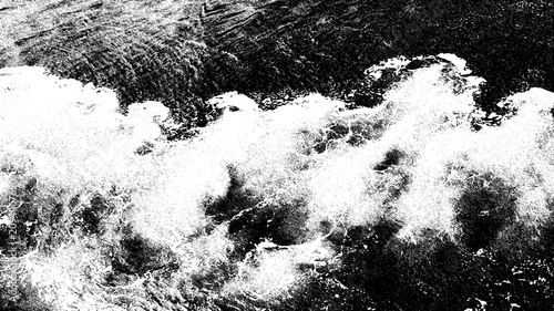Obraz na płótnie Black and white abstract water wave texture, monochrome sea foam background, high contrast grunge ocean ripple background