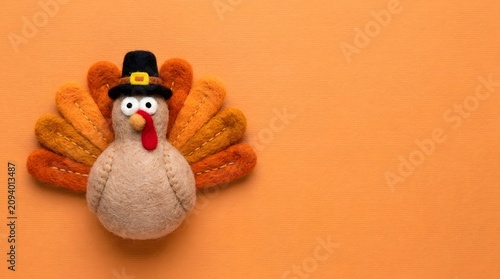Handmade Knitted Turkey Figurine with Top Hat and Bow Tie on Transparent Background