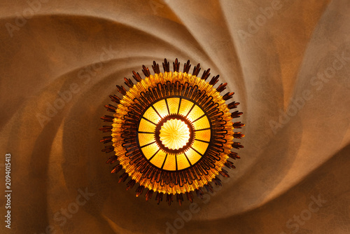 Foto Abstract pattern of swirls lit by round light
