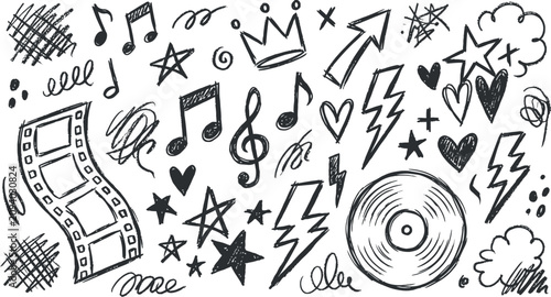 Hand drawn doodle icons of music film and media symbols
