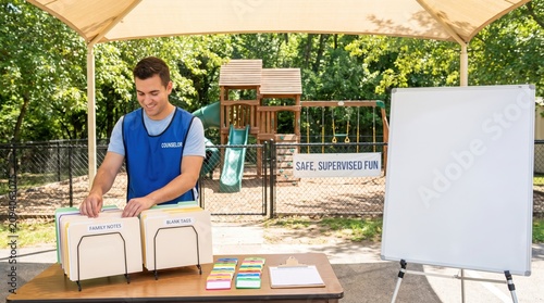 Staff Member Organizes for Summer Childcare, Camps & Activity Schedules