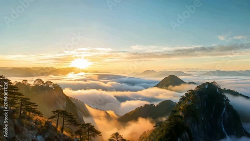 Sunrise Over Majestic Mountains with Sea of Clouds