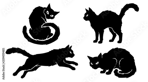 Photography Set of black cat silhouettes in various poses isolated on a white background for