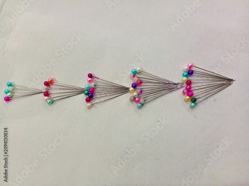 close up of colorful pins