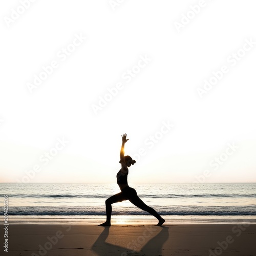 Beautiful Sunset Yoga Silhouette on Beach Waves Background for Summer Wellness
