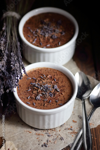 Canvastavla Healthy raw vegan chocolate souffle in white ramekin made of aquafaba decorated