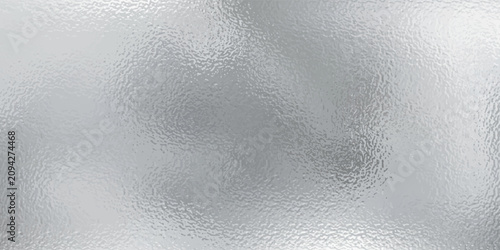 Fényképezés Silver foil texture background with light reflection