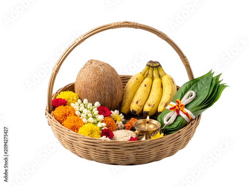 Traditional Indian puja offering basket with a whole coconut, fresh bananas, betel leaves, marigold flowers, and a brass diya isolated on a transparent background