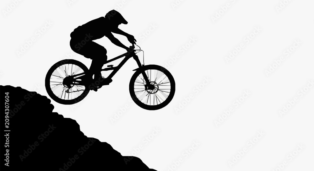 Fototapeta premium Mountain Biker Defies Gravity.