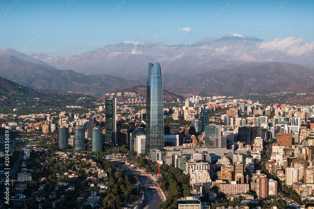 Fototapeta premium Aerial view of the Santiago skyline and Andean mountain scenery