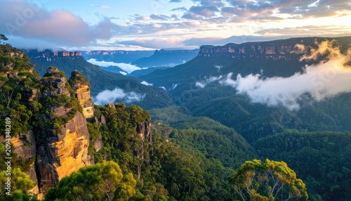 Misty sunrise over a lush, mountainous landscape with distinctive rock formations.