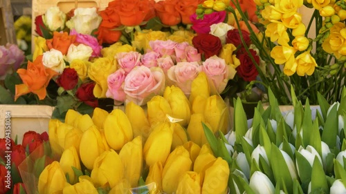 Colorful fresh spring flowers at market stall display