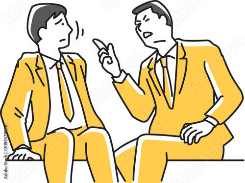 座って横の人に注意する会社員
