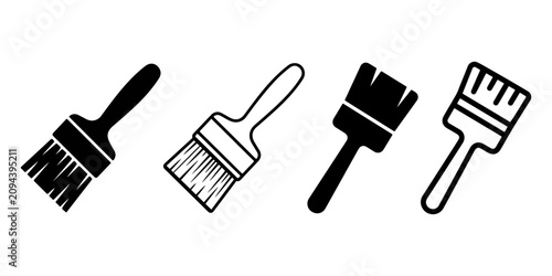 Fotografie Four black and white paint brush in a row on a white background paintbrush tool