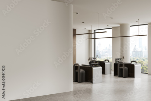 Modern spacious office interior featuring a large empty wall and sleek contemporary workstations in bright natural light with panoramic cityscape views. 3D Rendering