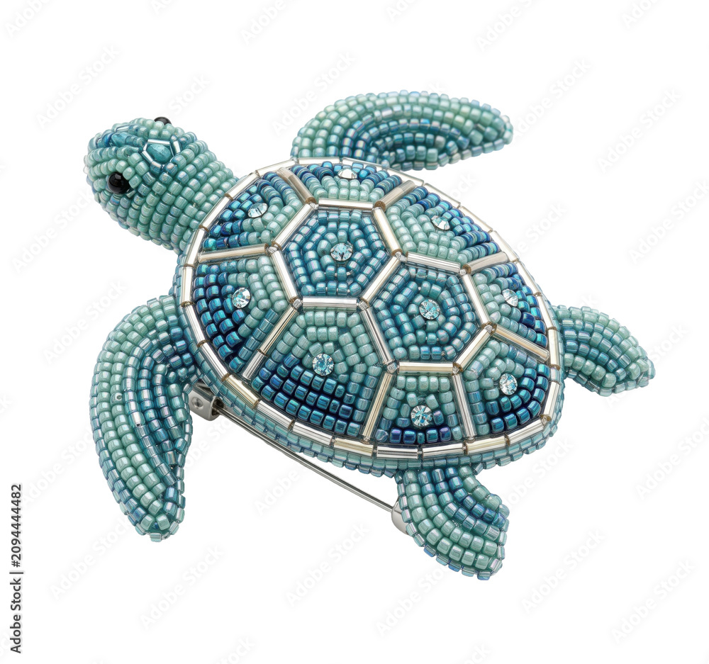 Fototapeta premium Light blue beaded sea turtle pin with crystal accents isolated on transparent background