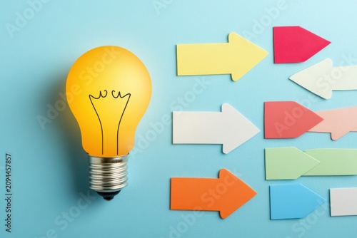 Light bulb arrow direction idea innovation leadership strategy choice sign path