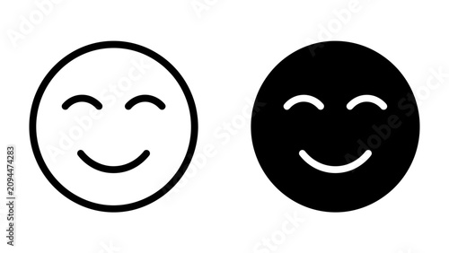 фотографія Simple Emoticon Faces: Two minimalist emoticon faces, one outlined and the other solid black, express a feeling of contentment and happiness with their closed eyes and gentle smiles