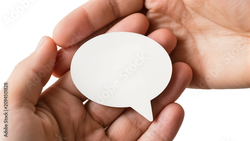 Isolated human hands holding a blank white speech bubble, concept of communication and idea