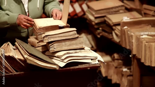 Archivist Looking For Historical Documents In Library. Storage Research Heritage 
