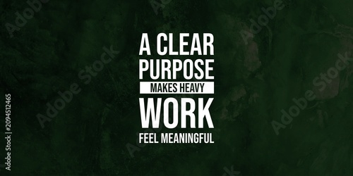 Fotografía Meaningful quote about how a clear purpose can make heavy work feel worthwhile, displayed in bold typography on a dark green textured background