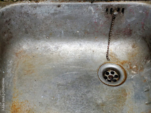 sink with dirty sink and tap in the bathroom