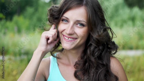 beautiful woman speaking on mobile phone