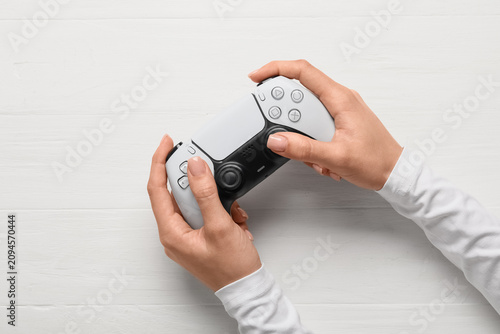 Person holding a modern whi...