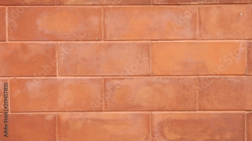 Close-up Background Texture of a Red Clay Brick Wall