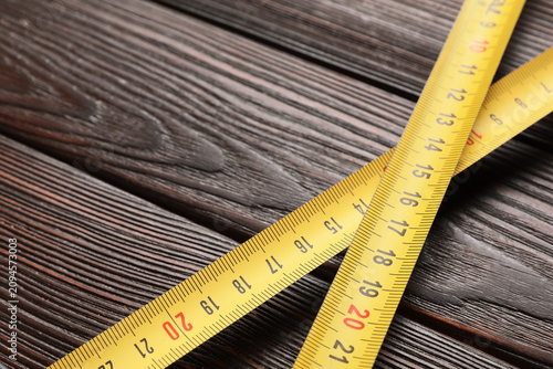 Yellow measuring tape with ...