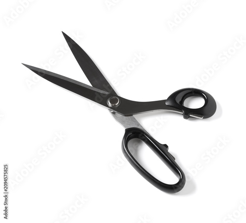 Принти на полотні Black handled open scissors with sharp metal blades for cutting fabric or paper,