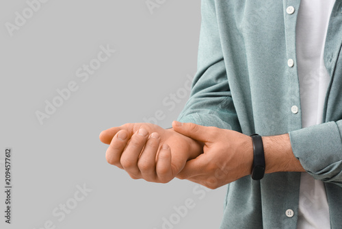 Man experiencing wrist pain...