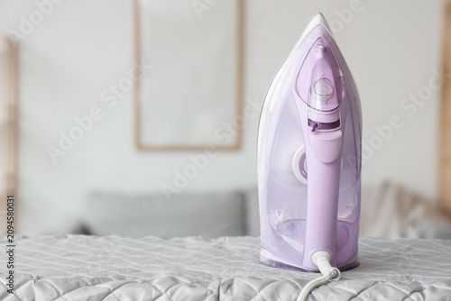 Lilac iron on board in livi...
