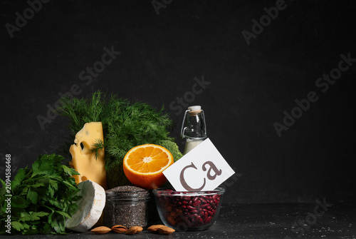 Paper with symbol Ca and he...