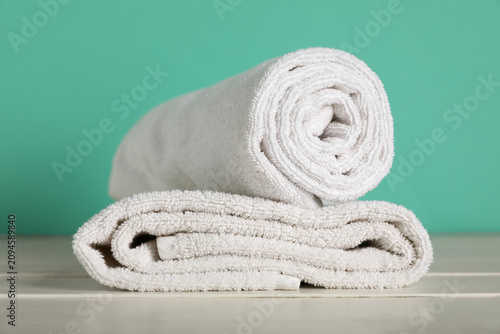 Clean soft towels on white ...