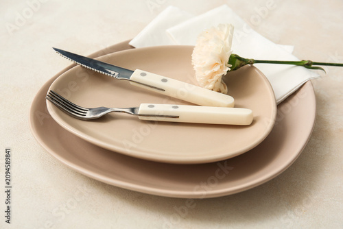 Plates with cutlery, paper ...