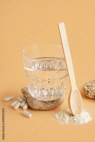 Glass of water with wooden ...