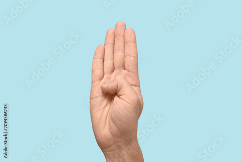 Hand of deaf mute man using...