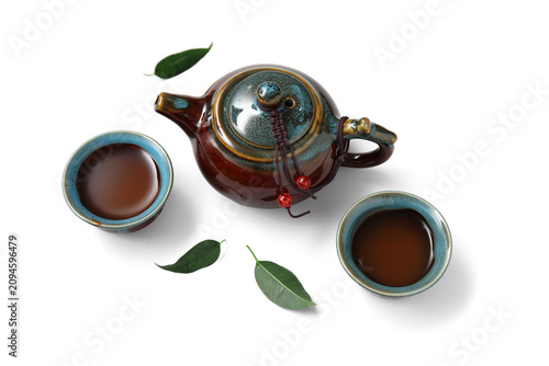 Chinese teapot, cups of tea...
