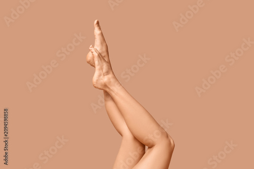 Legs of young woman on brow...