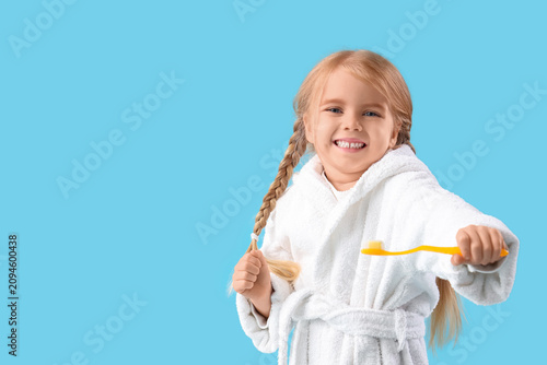Cute little girl with tooth...