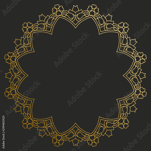 Circular photo frame with a gold rim and decorative leaf and floral patterns.