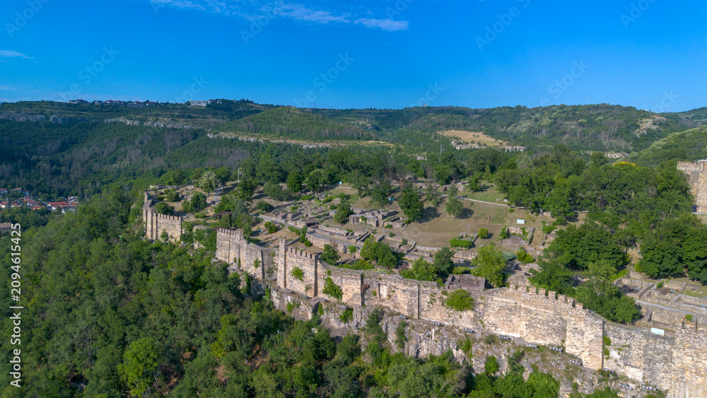 Naklejka premium Aerial view of Tsarevets medieval fortress and the Patriarchal Cathedral in Veliko Tarnovo Bulgaria