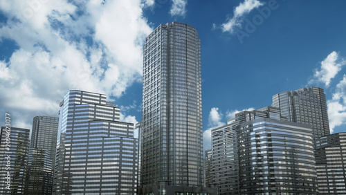 Cuadro en lienzo Towering glass skyscrapers stand tall against a bright blue sky with scattered white clouds