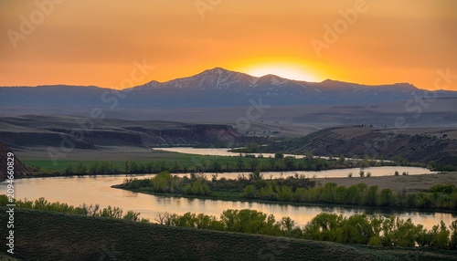 Snake River And Owyhees In Background During Sunset On A Spring Evening In Southern Idaho