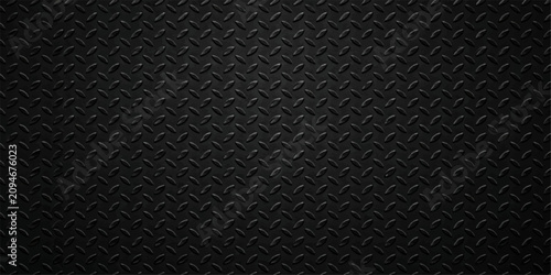 Black diamond plate metal texture background with industrial steel surface pattern for modern design projects
